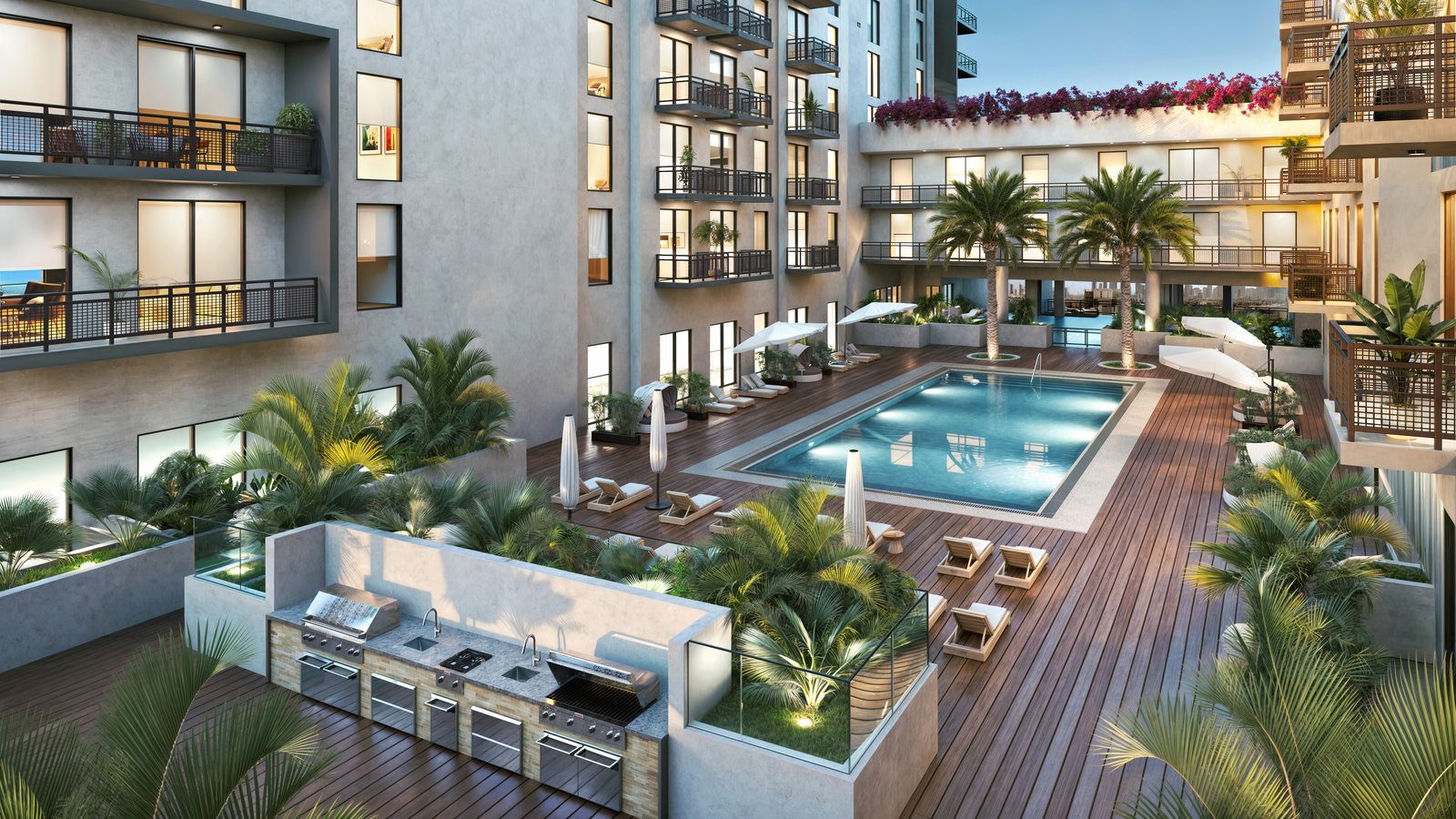 Elevated pool deck with sun terrace, summer kitchens and landscaped lounge areas, from the project renderings.